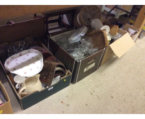 Four boxes containing various decorative glass and china, sundae dishes, table lamp, patterned rug etc