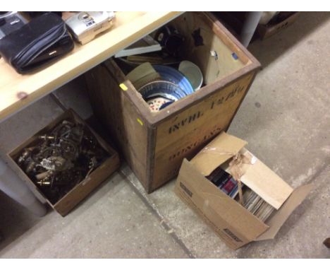 Three boxes containing DVDs, various sundry glass and china, wall light fitting etc.