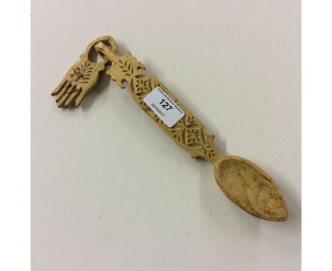 A Welsh carved wooden spoon 