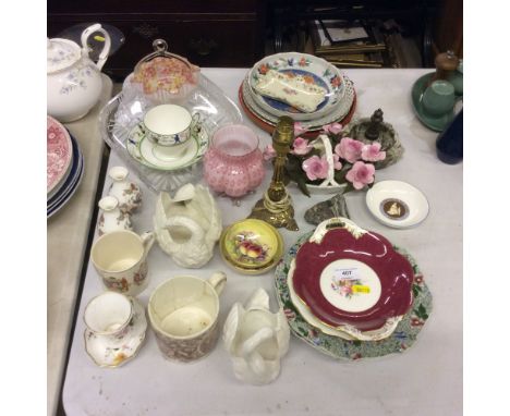 A collection of decorative china to include Wedgwood, Royal Crown Derby, Paragon etc.; a coloured glass vase; a small bras st