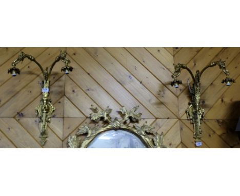 Matching Pair of Brass Wall Lights, each double light fitting extending from canine mouths, over rch shaped pillars, each 34”