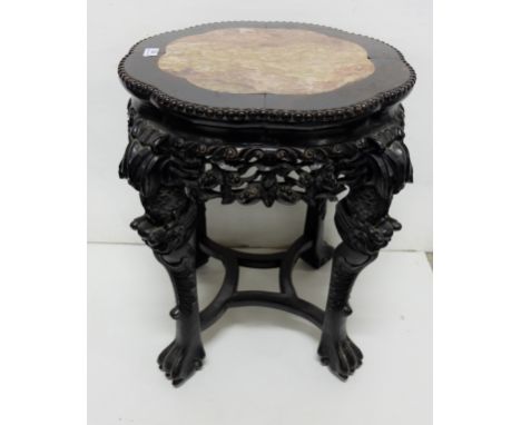 Carved hardwood Chinese Lamp Table, inset with red marble p, profusely carved, 23”h x 18”dia