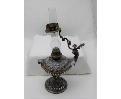 Late 19thC Silver Plated “Genie Oil Lamp”, decorated with mask of roman man, fluted sides, glass funnel, 21”h