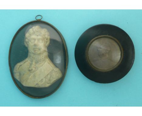 George IV: a wax relief head and shoulders portrait within a convex glass frame, 126mm high and a papier-mâché circular box a