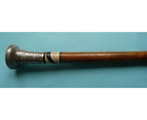 Winston Churchill: a walking stick the engraved silver pommel hallmarked for London 1920 with an ebonised and bone ivory coll