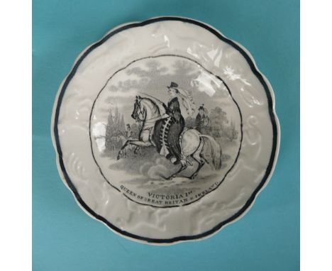 1837/38 Victoria: a nursery plate the border moulded with animals printed in black with an equestrian portrait entitled ‘Vict
