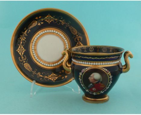 George III: a small twin handled cup and saucer by Flight Barr & Barr of Worcester, the deep blue ground well gilded and pain