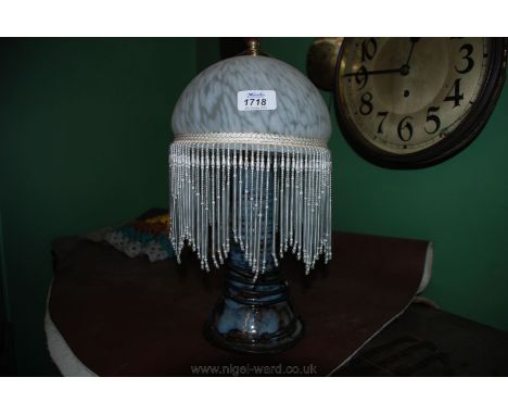 A blue Ewenny Table Lamp with white droplet shade, 15'' tall.