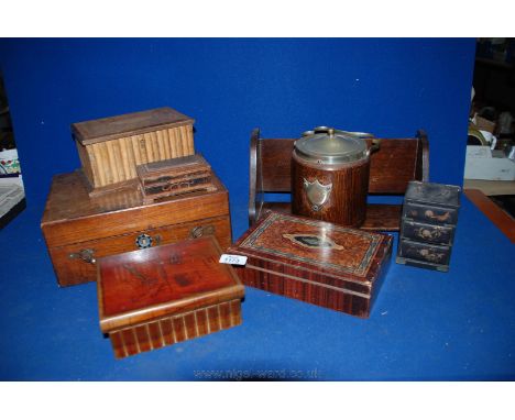 An Oak Biscuit Barrel with plated lid and handle and china liner, oak bookshelf, wooden trinket boxes (two in the form of boo