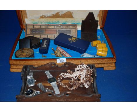 A wooden Cutlery Box with miscellaneous contents including Cribbage board, Bosun's Whistle, miniature Barrels, 'Silverstar' H