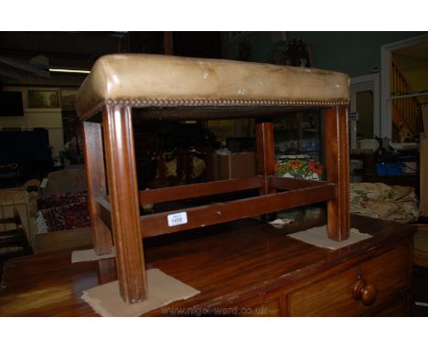 A modern Georgian style Footstool, having olive green leather seat with nailed detail, on gently fluted square legs with surr