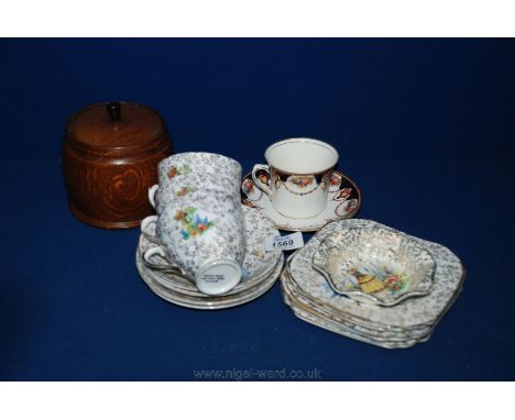 A part Teaset, Crinoline lady 1930's-1940's, a wooden Tea caddy and an additional cup and saucer