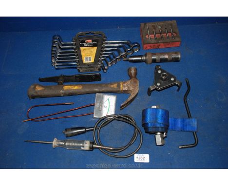 An eight piece deep offset Ring Spanner Set, 6 mm to 22 mm, a set of five burrs, an impact driver, two oil filter wrenches, a