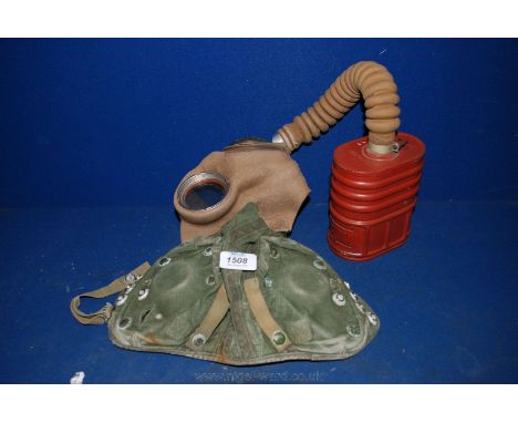 An old Flying Helmet and an old Gas Mask