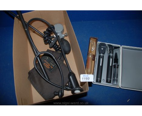 An 'Accoson' Blood Pressure Monitor, a Stethoscope, boxed ''Belcroy'' Tube Feeder, a cased Thermometer, and a cased 'Heine Me