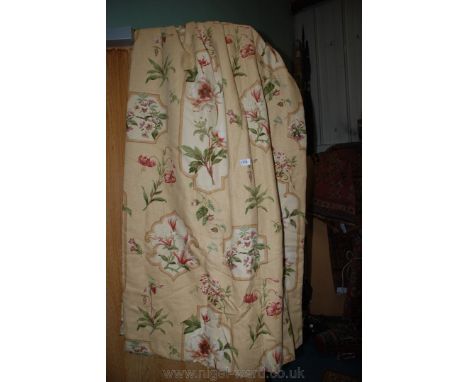 A pair of lined Curtains in peony, lily and blossom pattern on a beige background.  74'' wide x 62'' drop
