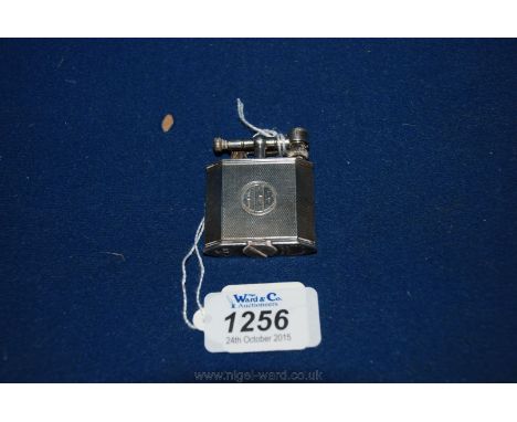 A Silver Dunhill lighter, Patt nos. 390107