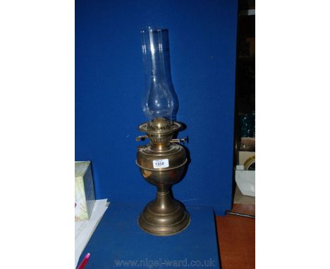 A Brass Oil Lamp and chimney.