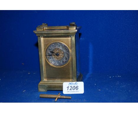 A Brass Carriage Clock with key by R & Co.