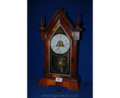 A 'New Haven' wooden cased chiming bracket Mantle Clock, with etched glass panel, key and pendulum
