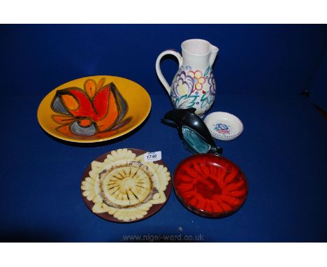 A quantity of Poole Pottery and Welsh Pottery including jug, pin dish, Dolphin, bowl, etc.