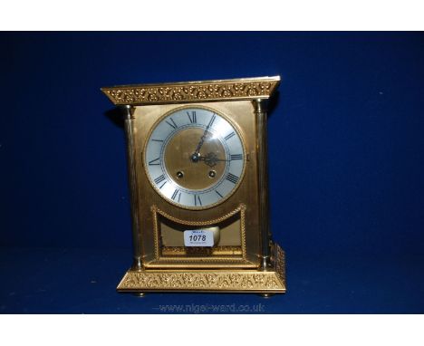 A large Brass cased Mantle Clock.