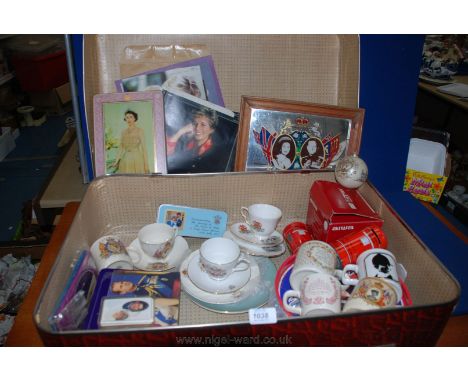 A suitcase containing Royal memorabilia including Mugs, Cups and Saucers, Tins, books, etc.