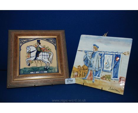 Two ceramic Tiles, one from Rye Tiles depicting 'The Squire' in a wooden frame, the other an Italian tile with flag bearer, s