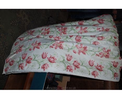 A pair of thermal lined Curtains in pretty pink floral design on a cream background.  76'' wide x 55'' drop