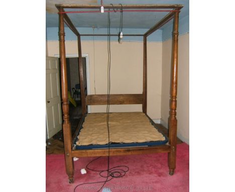 A late 18th /early 19th c. Oak four poster Bed, having Pine top surround with wrought iron curtain pole, the toe end posts be