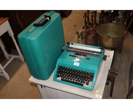 An Olivetti Studio 45 portable typewriter with fitted case