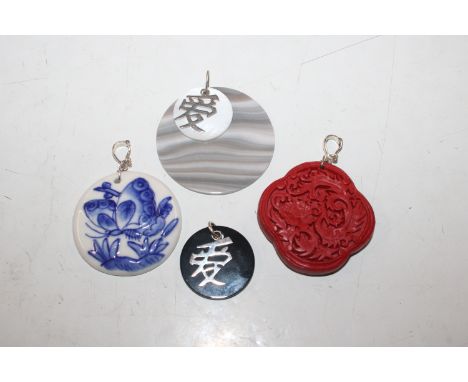 Four large Chinese pendants with Sterling silver bales (one cinnabar type)