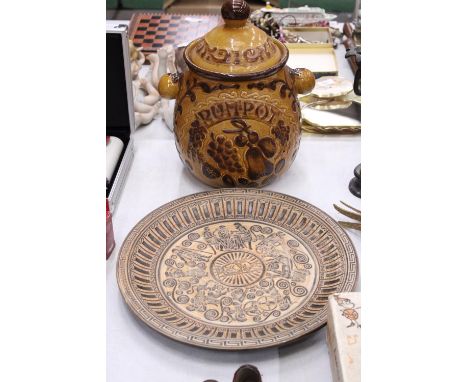 A LARGE WEST GERMAN RUMTOPF, HEIGHT 34CM PLUS A GERMAN CERAMIC PLATE WITH CLASSICAL FIGURE DECORATION, DIAMETER 35CM 