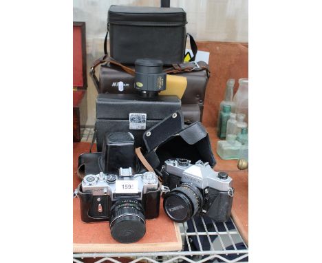 AN ASSORTMENT OF CAMERA EQUIPMENT TO INCLUDE A ZENIT CAMERA, YASHICA CAMERA AND A CANON ZOOM LENS ETC 