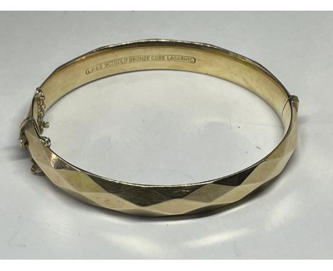 A GOLD PLATED BANGLE 