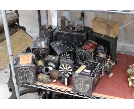 A LARGE ASSORTMENT OF VINTAGE BELIEVED MILITARY ISSUED AREOPLANE PARTS TO INCLUDE VOLT METERS AND COMPASS PARTS ETC 