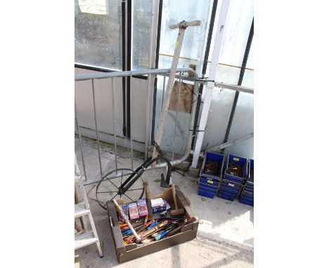 AN ASSORTMENT OF FILES AND RASPS AND A VINTAGE CULTIVATION TOOL 