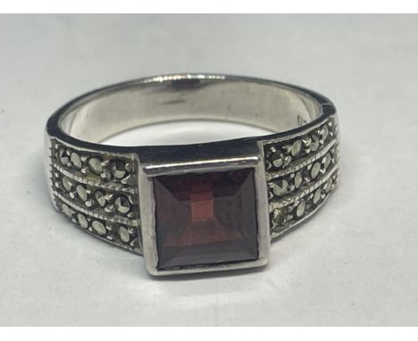 A SILVER SIGNET RING WITH SQUARE STONE SIZE R 