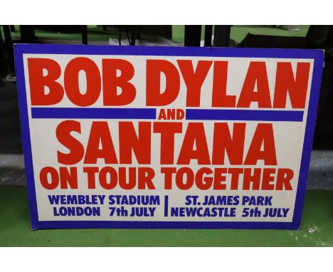 A VINTAGE "BOB DYLAN AND SANTANA" TOUR ADVERT ON BOARD 