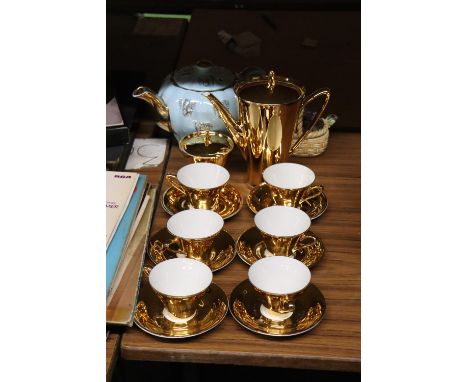 A GILT COLOURED COFFEE POT, SUGAR BOWL, CUPS AND SAUCERS, PLUS A VINTAGE SUDLOW'S TEAPOT AND A PRESERVE POT 