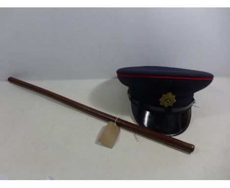 A ROYAL ARMY SERVICE CORP CAP SIZE 58 AND A LEATHER SWAGGER STICK 