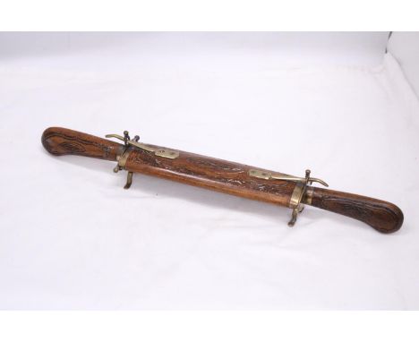A HAND CARVED INDIAN KNIFE AND FORK 