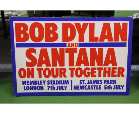 A VINTAGE "BOB DYLAN AND SANTANA" TOUR ADVERT ON BOARD 