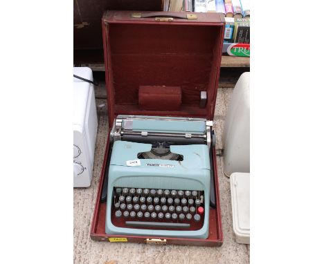 AN OLIVETTI STUDIO 44 TYPEWRITER WITH CARRY CASE 