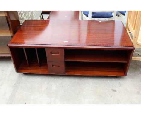 A RETRO MAHOGANY AND CROSSBANDED MEREDEW COFFEE TABLE ENCLOSING DRAWERS, RECORD RACK AND SHELF, 48" X 23" 