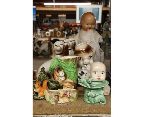 A QUANTITY OF CERAMIC ITEMS TO INCLUDE WITHERNSEA FLORA AND FAUNA VASES, DOGS, A DOLL'S HEAD AND A VINTAGE DOLL 
