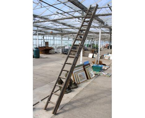 A VINTAGE 36 RUNG WOODEN TWO SECTION EXTENDABLE LADDER 