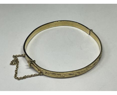 A GOLD PLATED BANGLE 