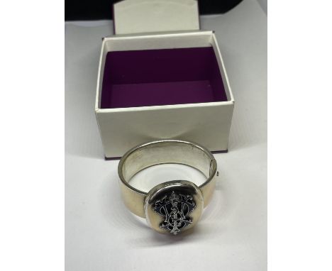A VICTORIAN COAT OF ARMS BANGLE 
