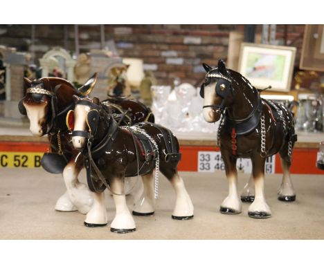 THREE LARGE CERAMIC SHIRE HORSE FIGURES WITH HARNESSES 